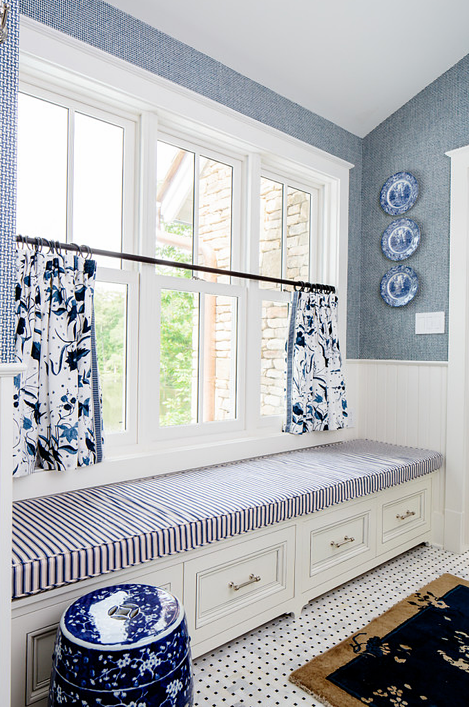 blue and white hallway with window seat