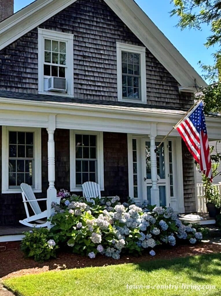 hydrangeas in front of coastal porch
