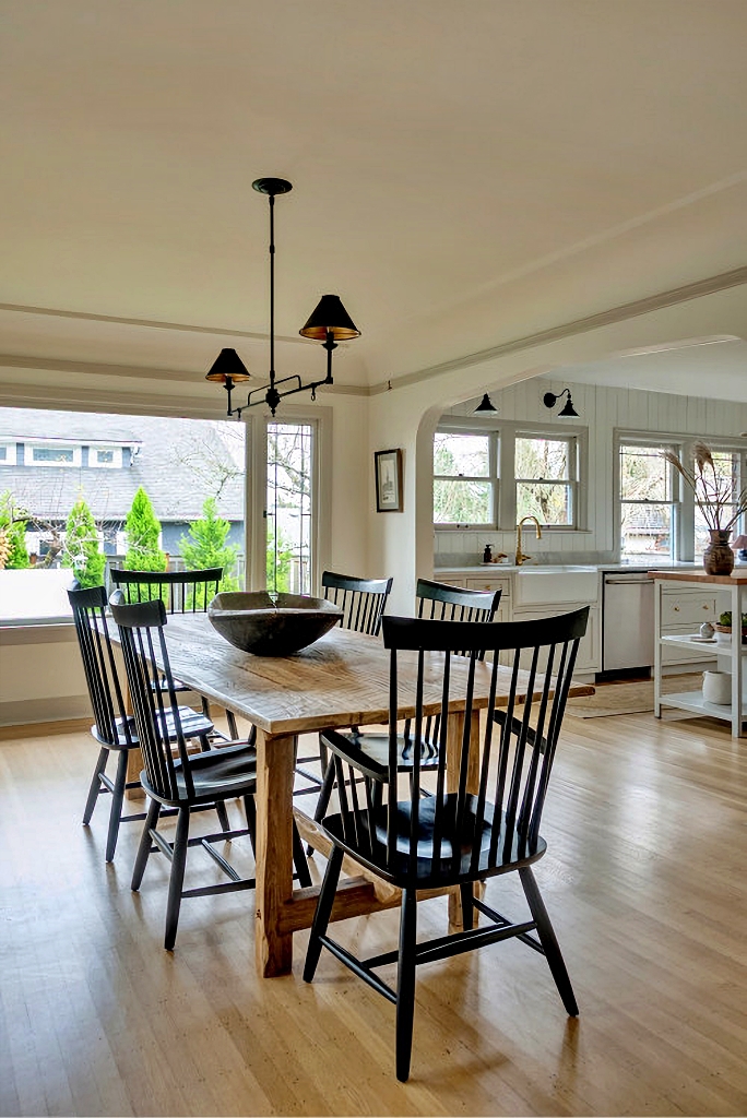 black Windsor chairs in kitchen dining nook