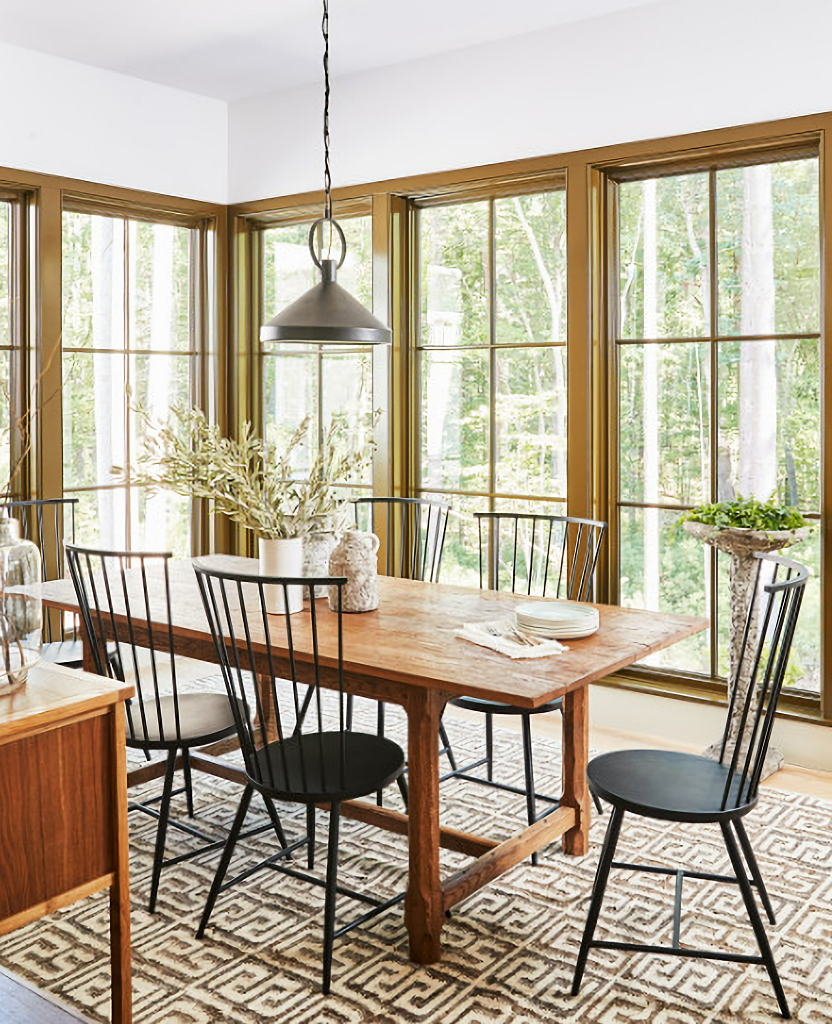 dining room with wrap around windows