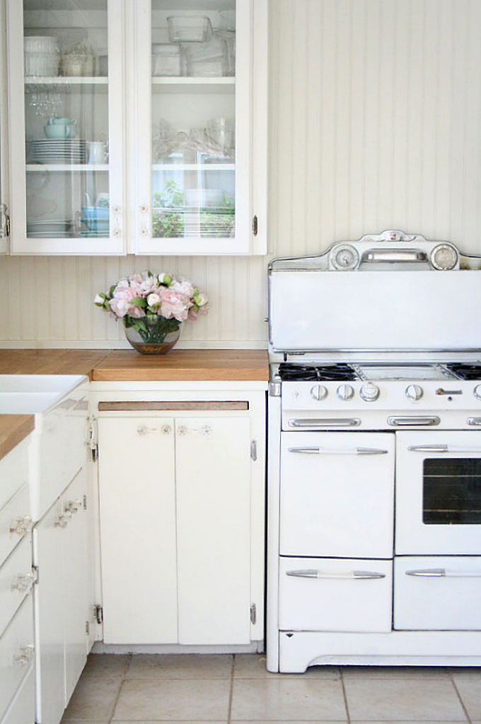 vintage stove in white cottage kitchen