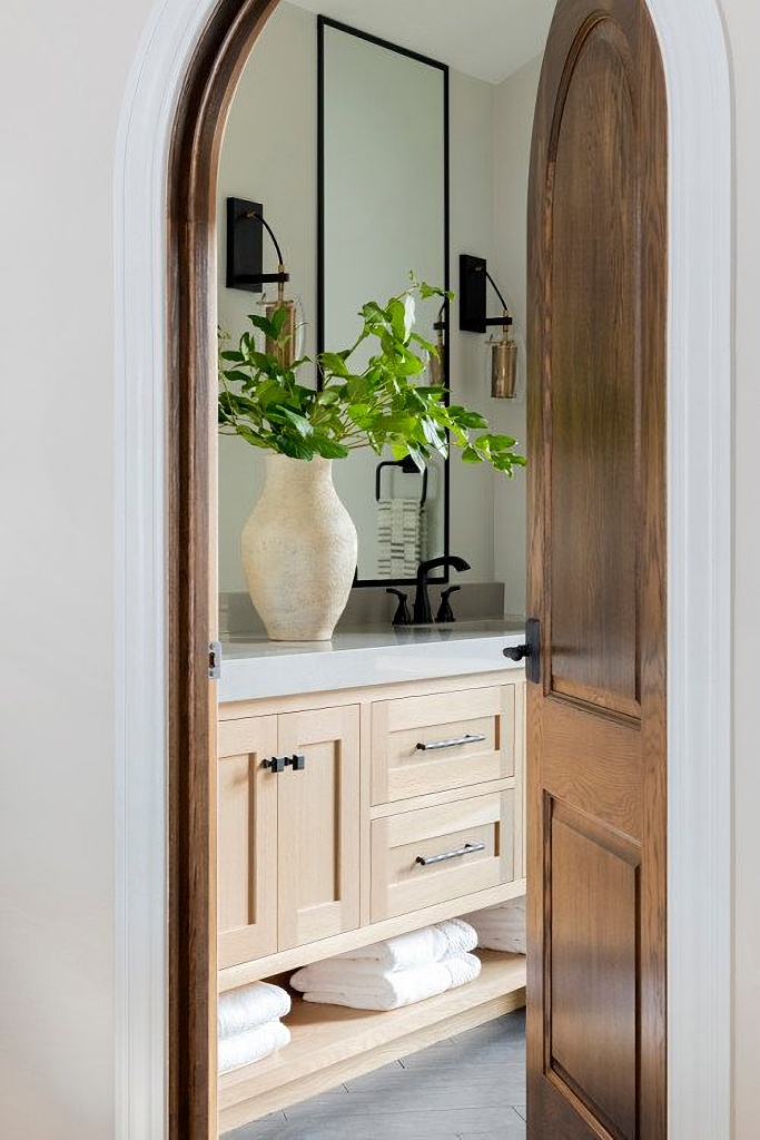 arched doorway into bathroom