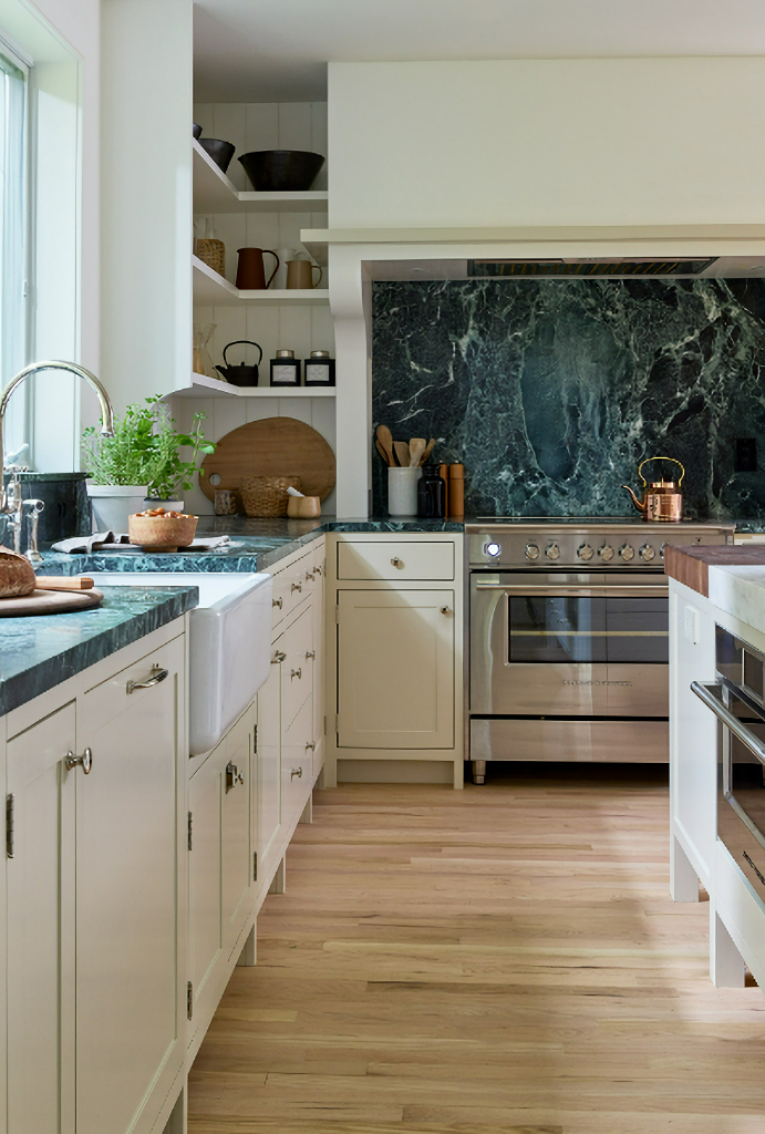 kitchen with cream cabinets and green countertops