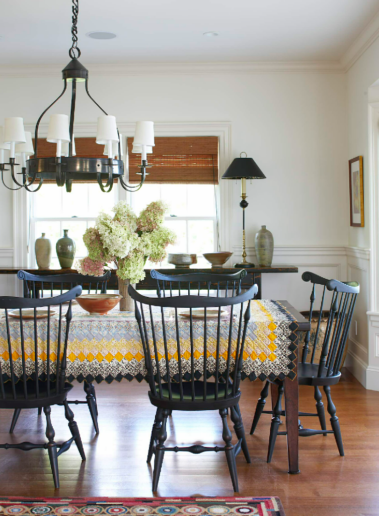 farmhouse dining room with quilt cover table