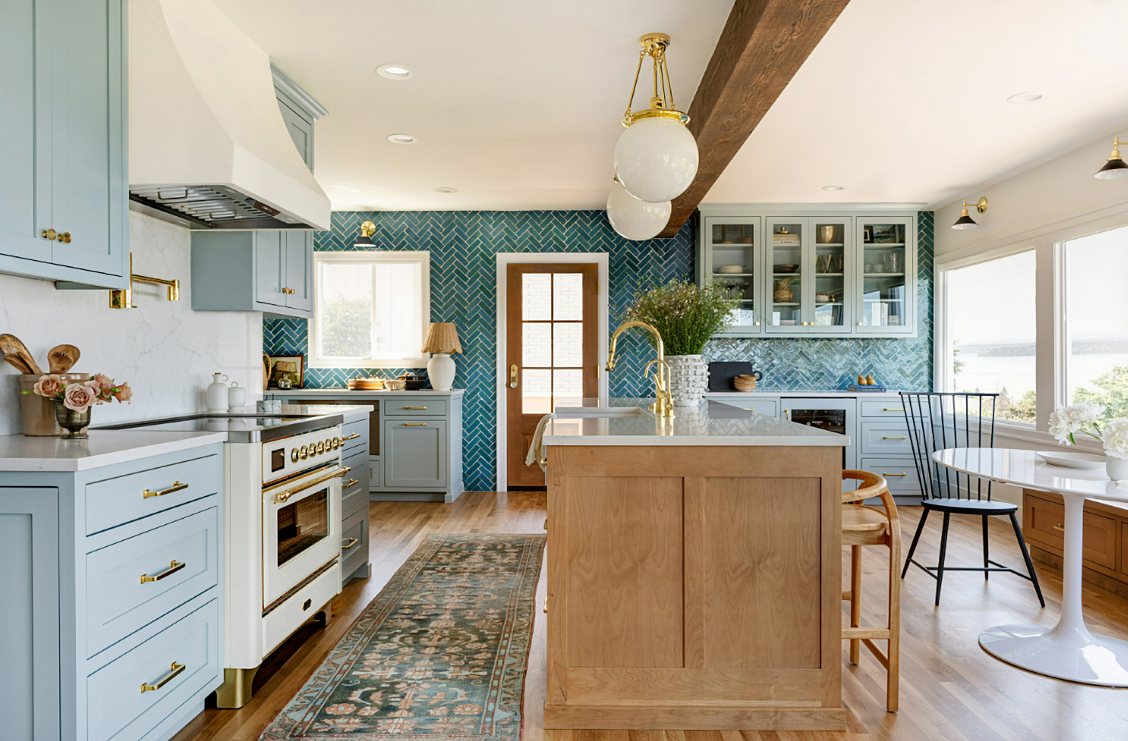 spacious coastal kitchen in turquoise and wood