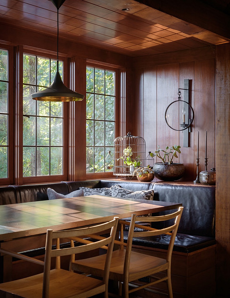 cozy dining nook with wood paneling