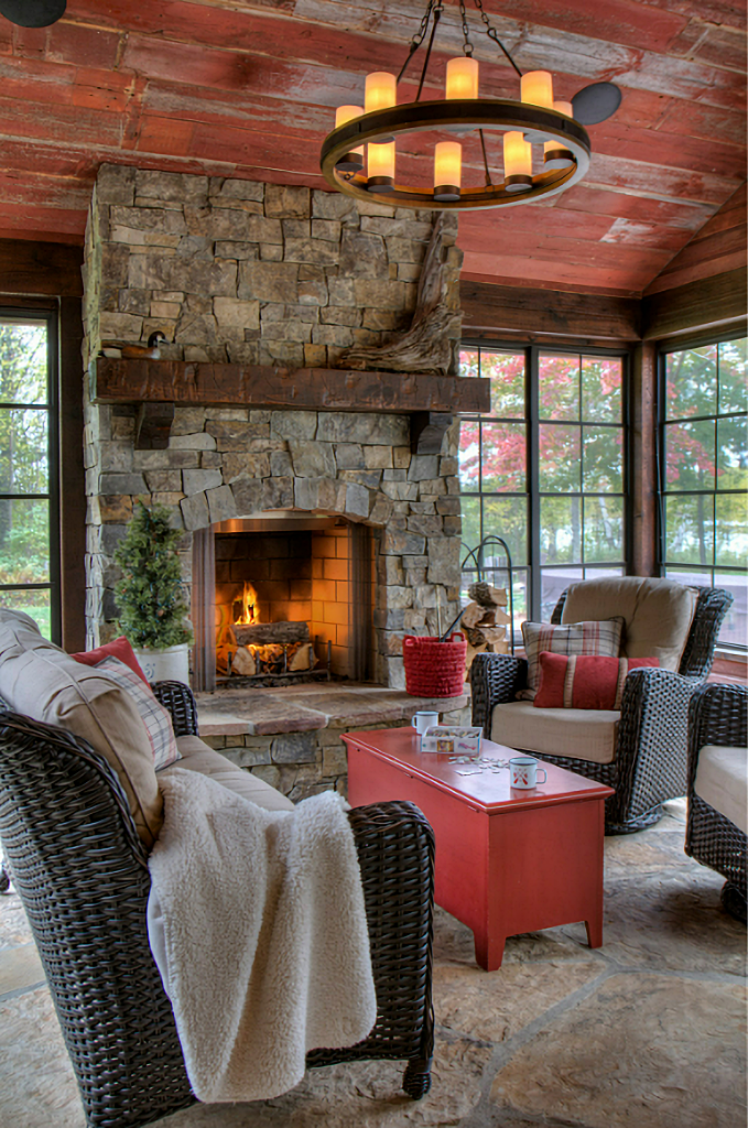 cabin style porch with stone fireplace