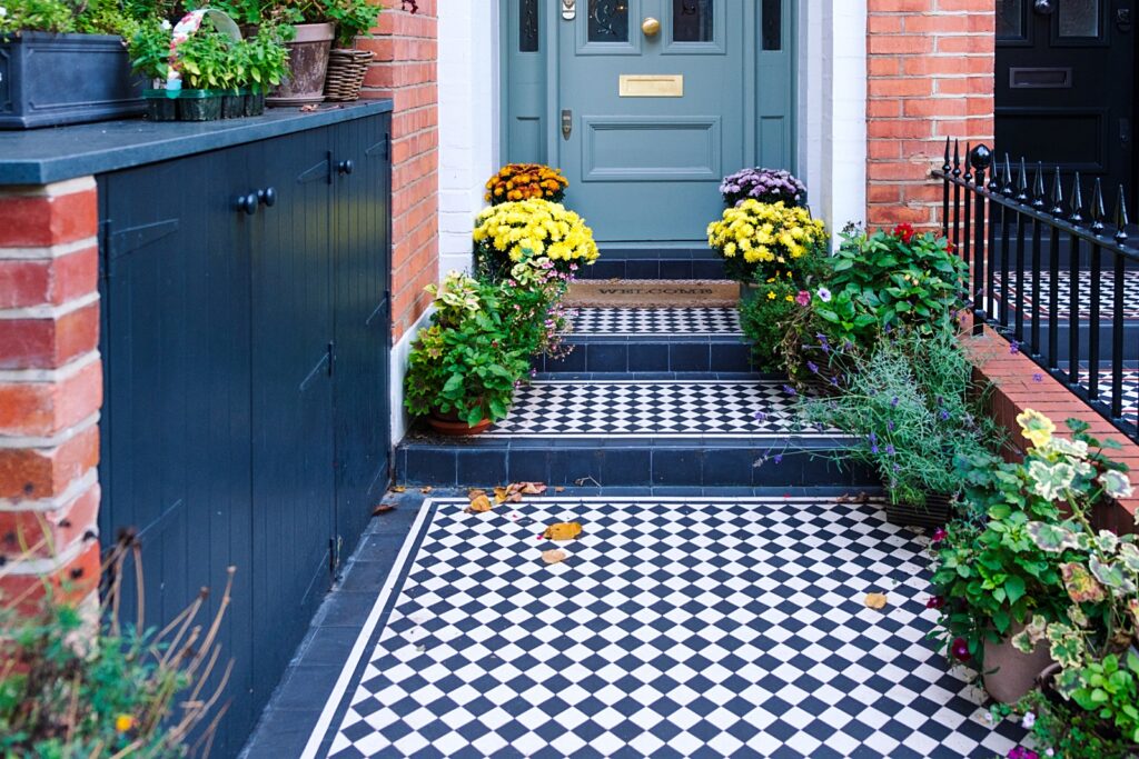 Victorian home in London with checkerboard walkway