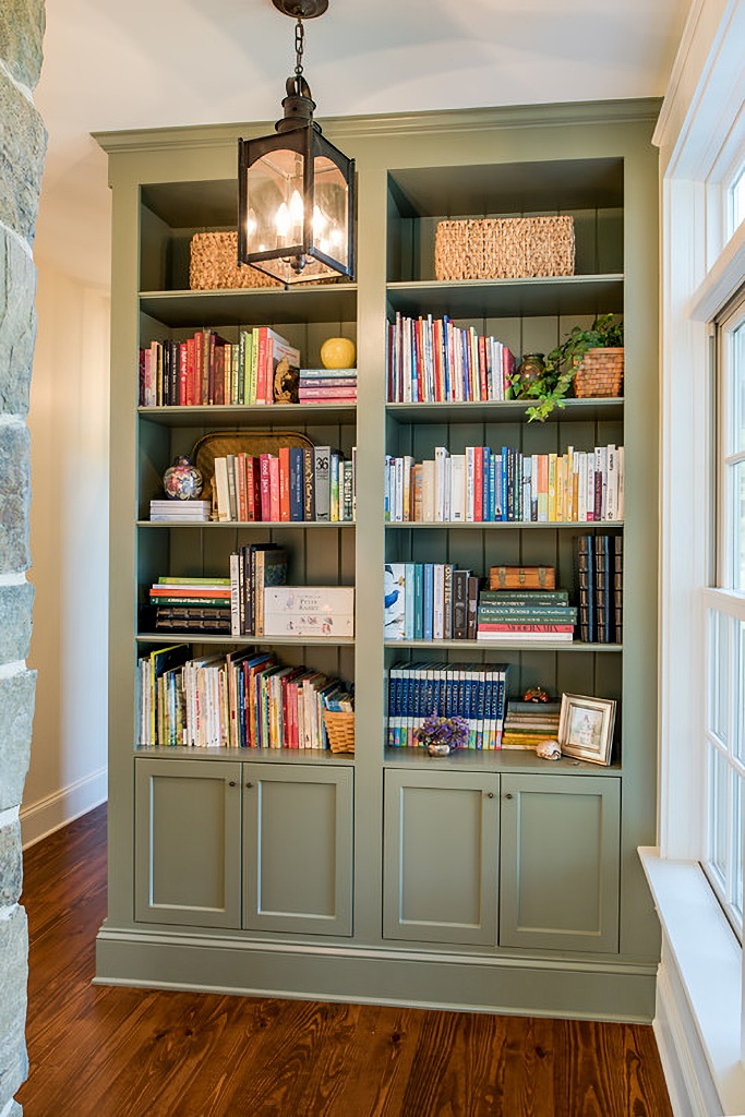 sage green built-in bookcase