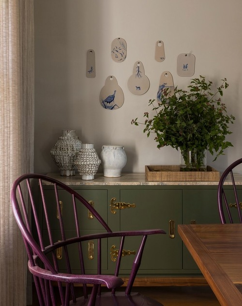 plum Windsor chairs in dining room