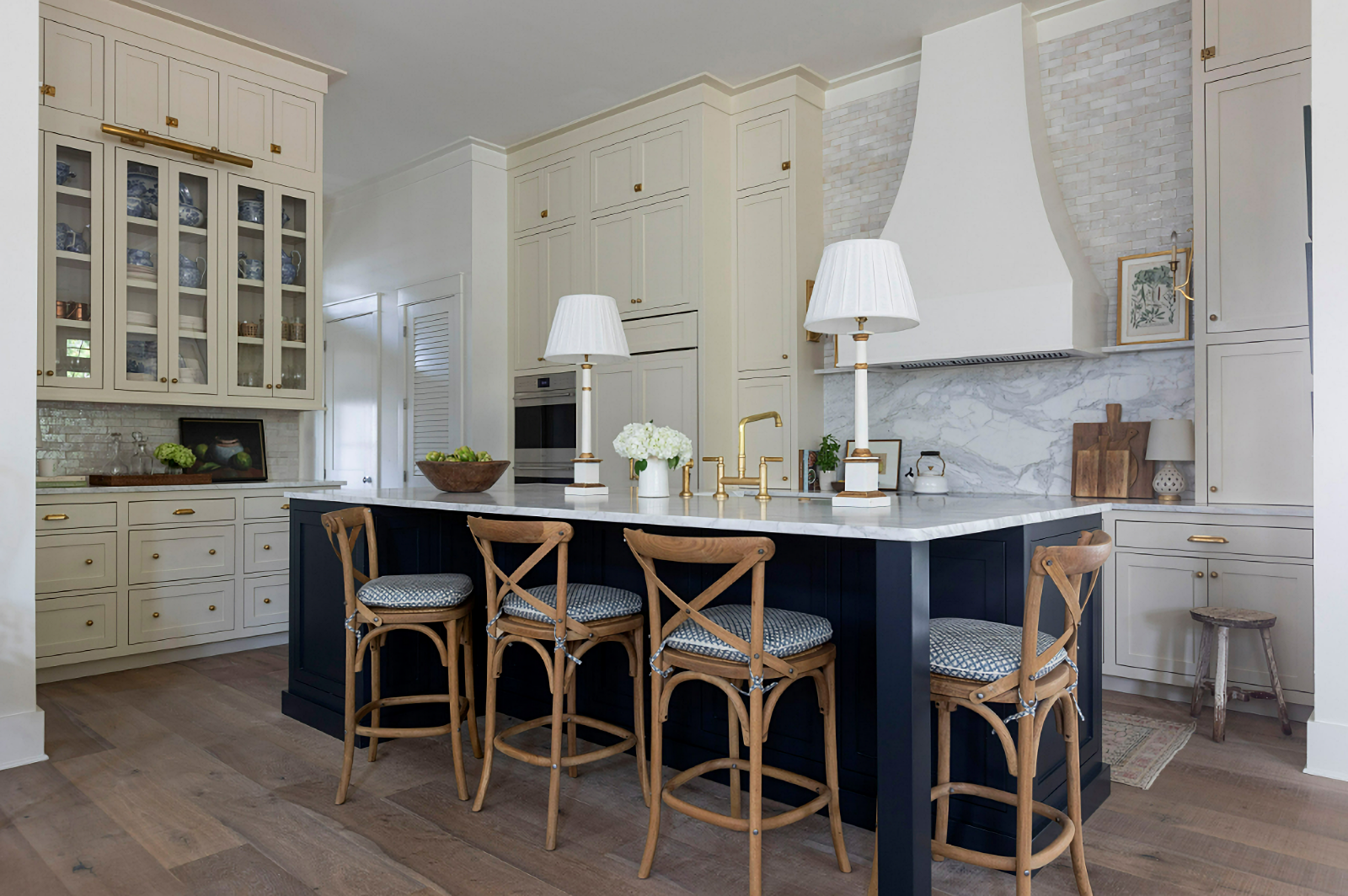 traditional kitchen with dark blue island