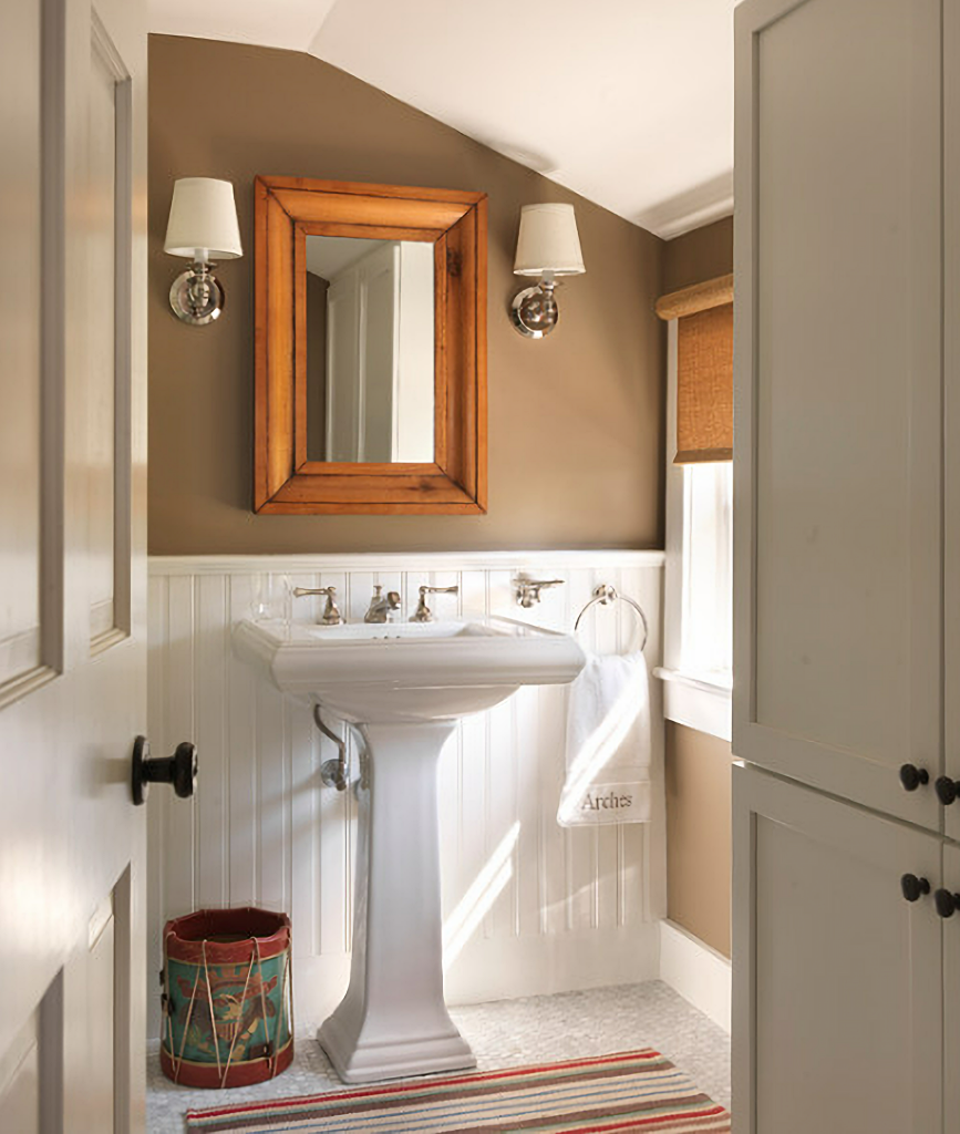 brown and white powder room