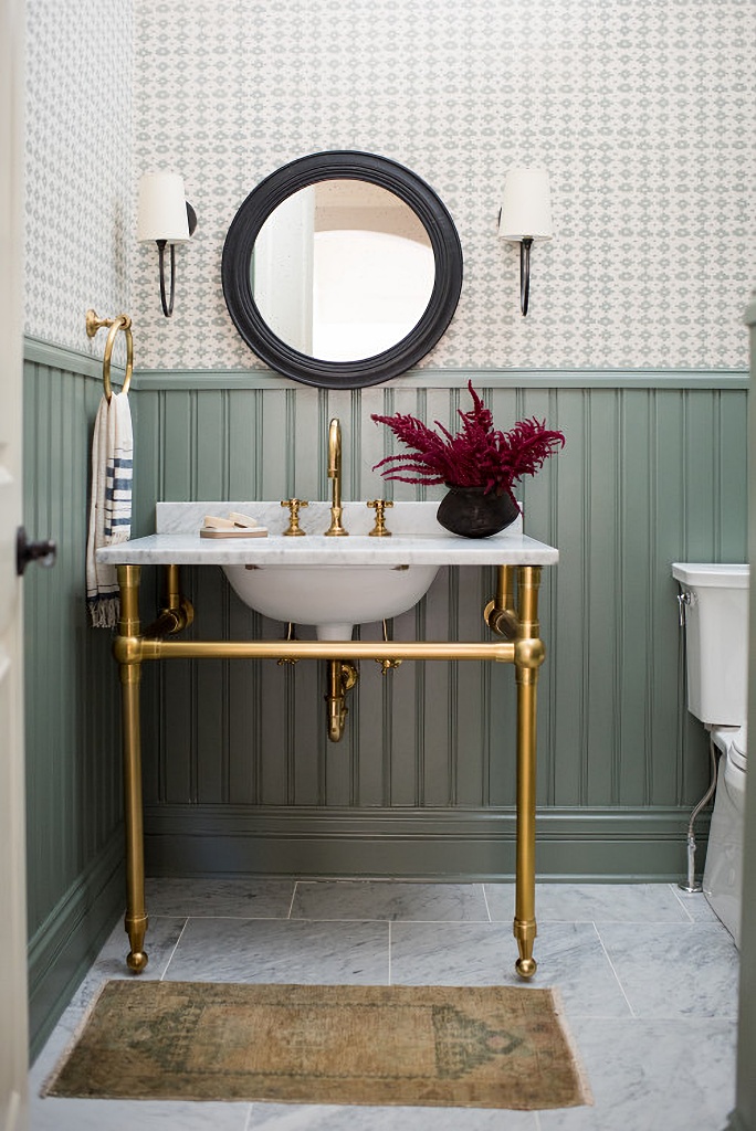 powder room with beadboard and wallpaper