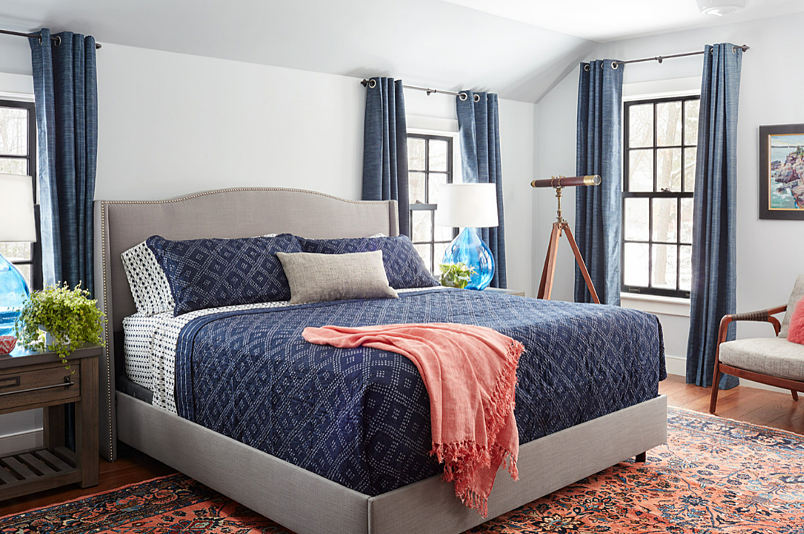 Navy and coral primary bedroom