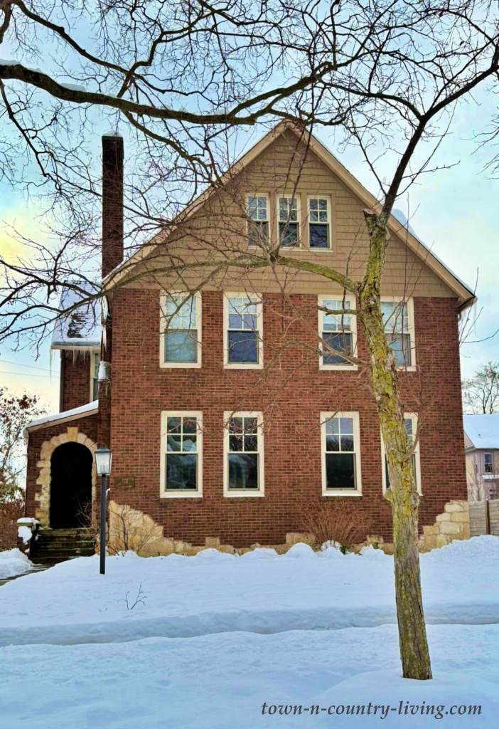 Brick home in the snow