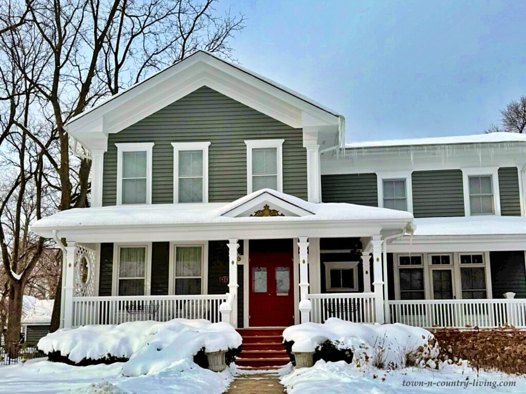 Greek revival home in snow