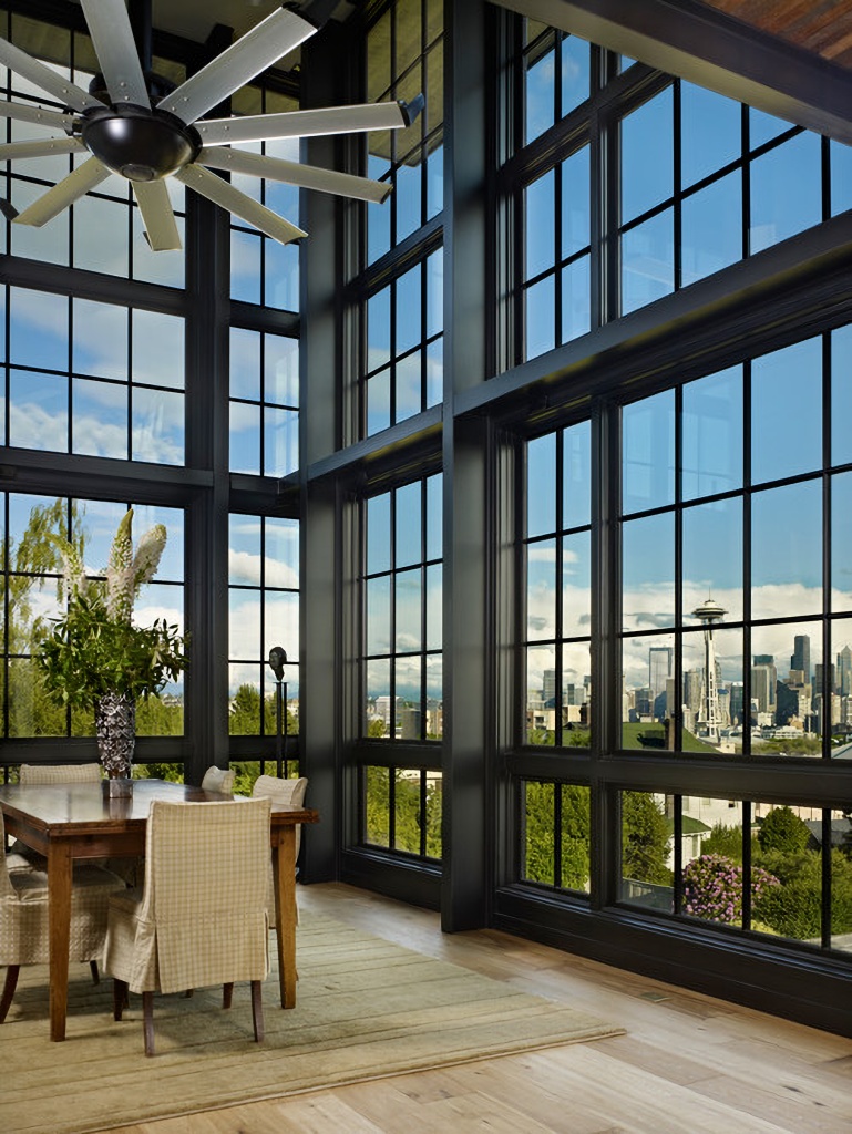 modern floor to ceiling windows in dining room