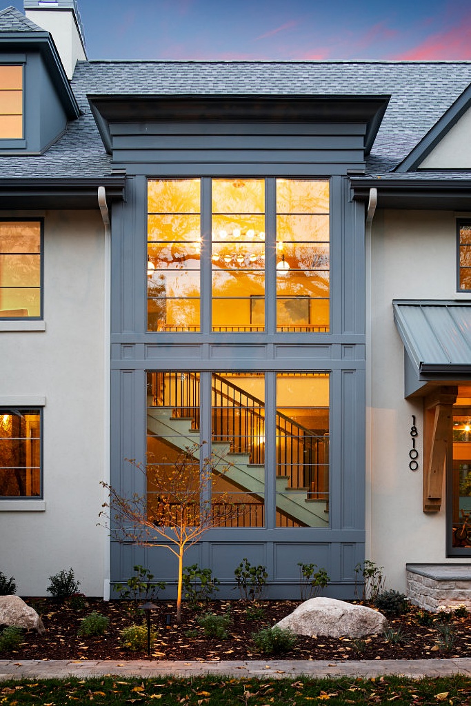 large exterior windows framing a staircase