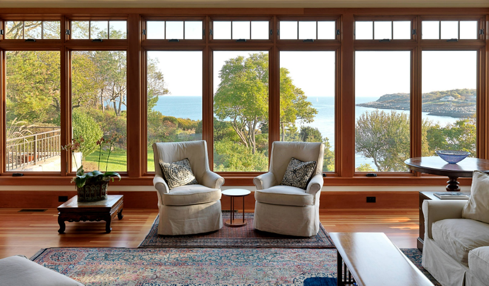 living room windows framing a waterfront view