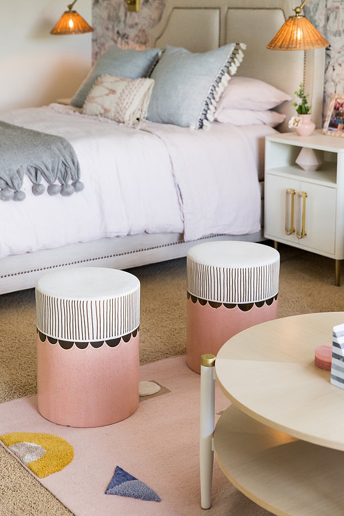 layered bedding in soft, feminine bedroom