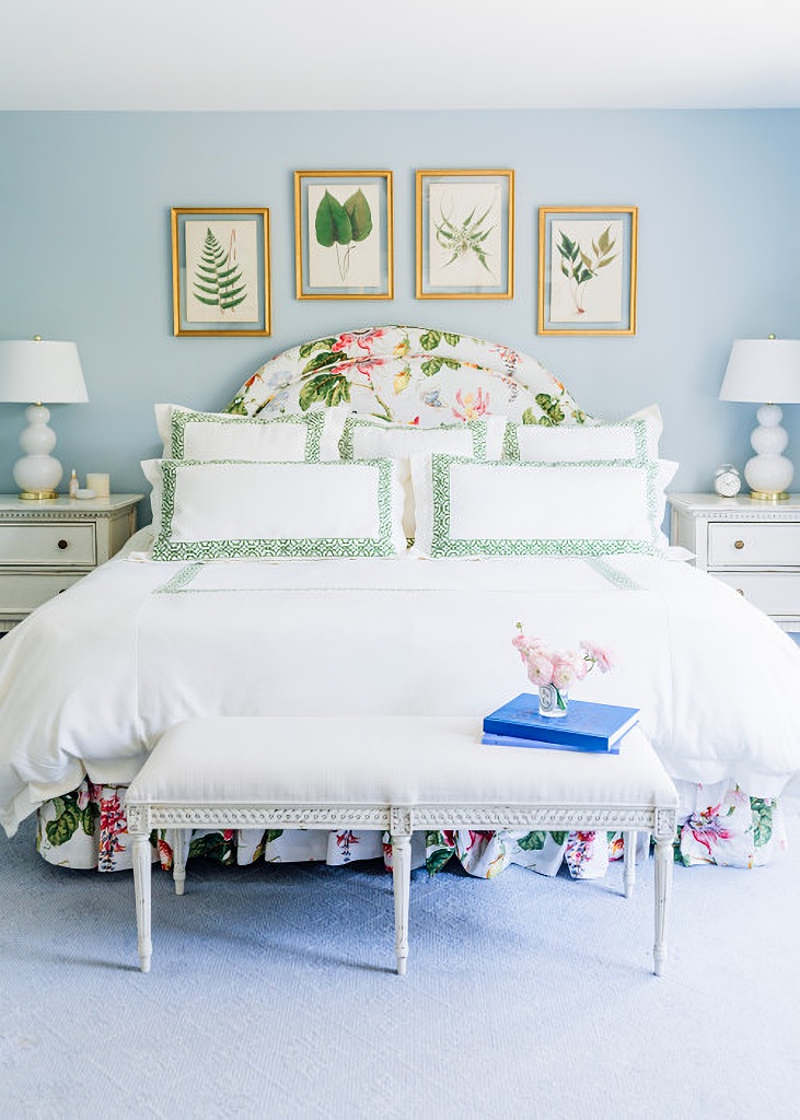 springtime bedroom with floral upholstered headboard