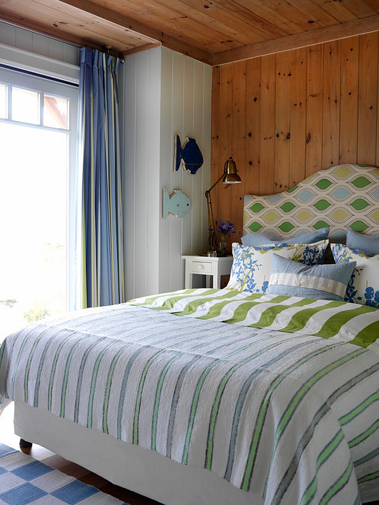 coastal style bedroom with blue and green patterns