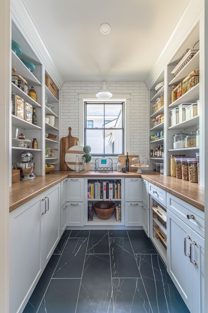 traditional walk-in pantry off of kitchen