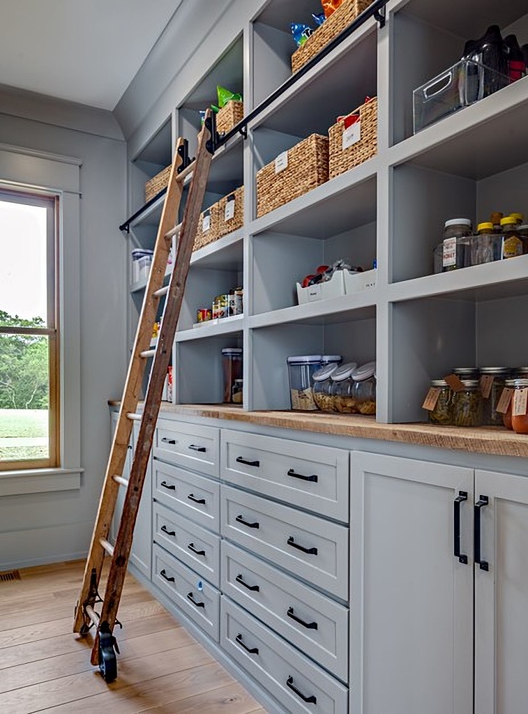 pantry with rolling ladder