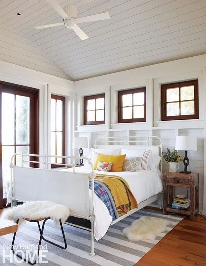 modern farmhouse bedroom with vintage metal bed