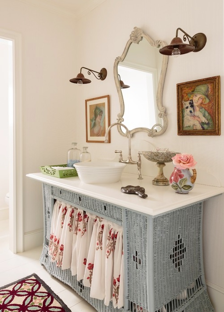 feminine light blue bathroom vanity with floral skirt