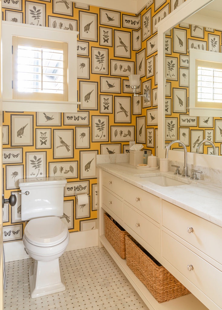 powder room with bold wallpaper