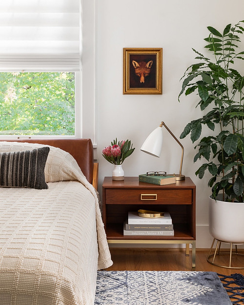 primary bedroom that blends old and new