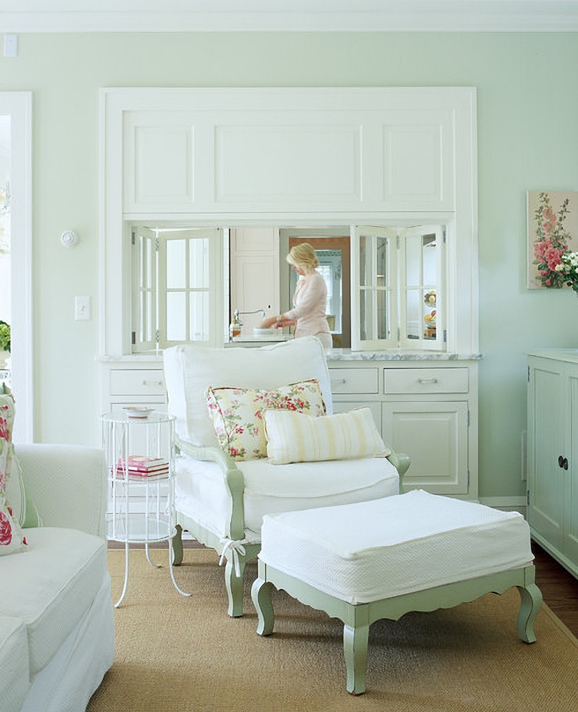 pale spring green living room with white furniture