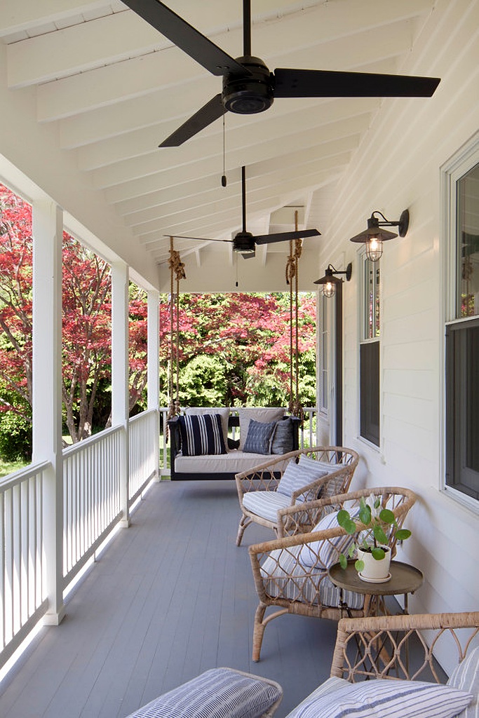 long front porch with simple furniture