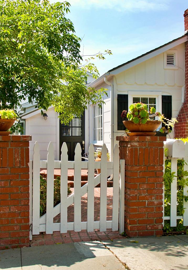 charming, white, beach bungalow with black shutters