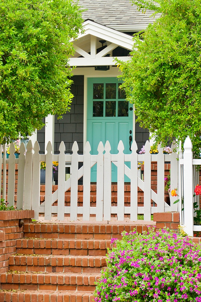 charming vintage beach bungalow with turquoise front door