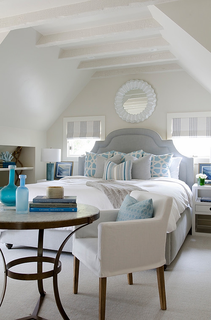 primary bedroom in soft blue and white