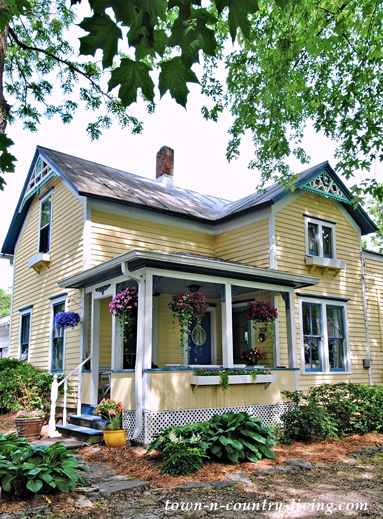 yellow Victorian cottage