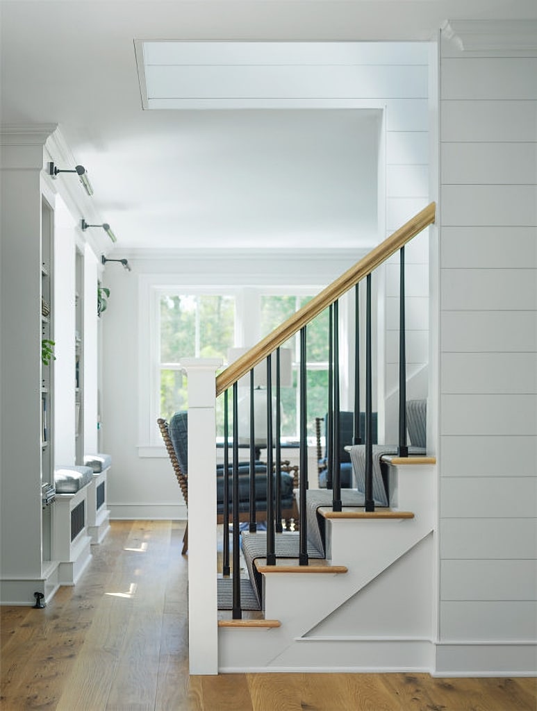 modern country staircase with wood and iron