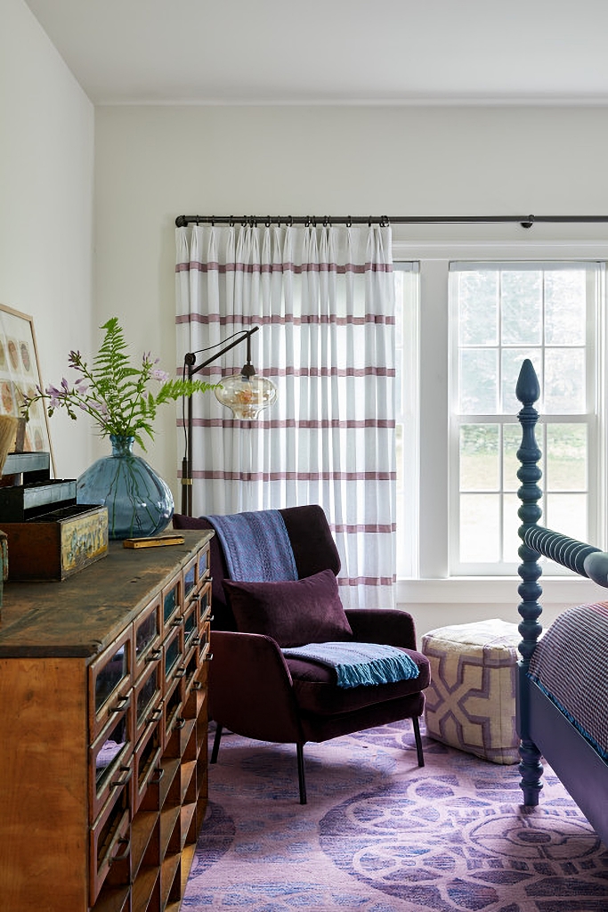 primary bedroom with vintage furniture