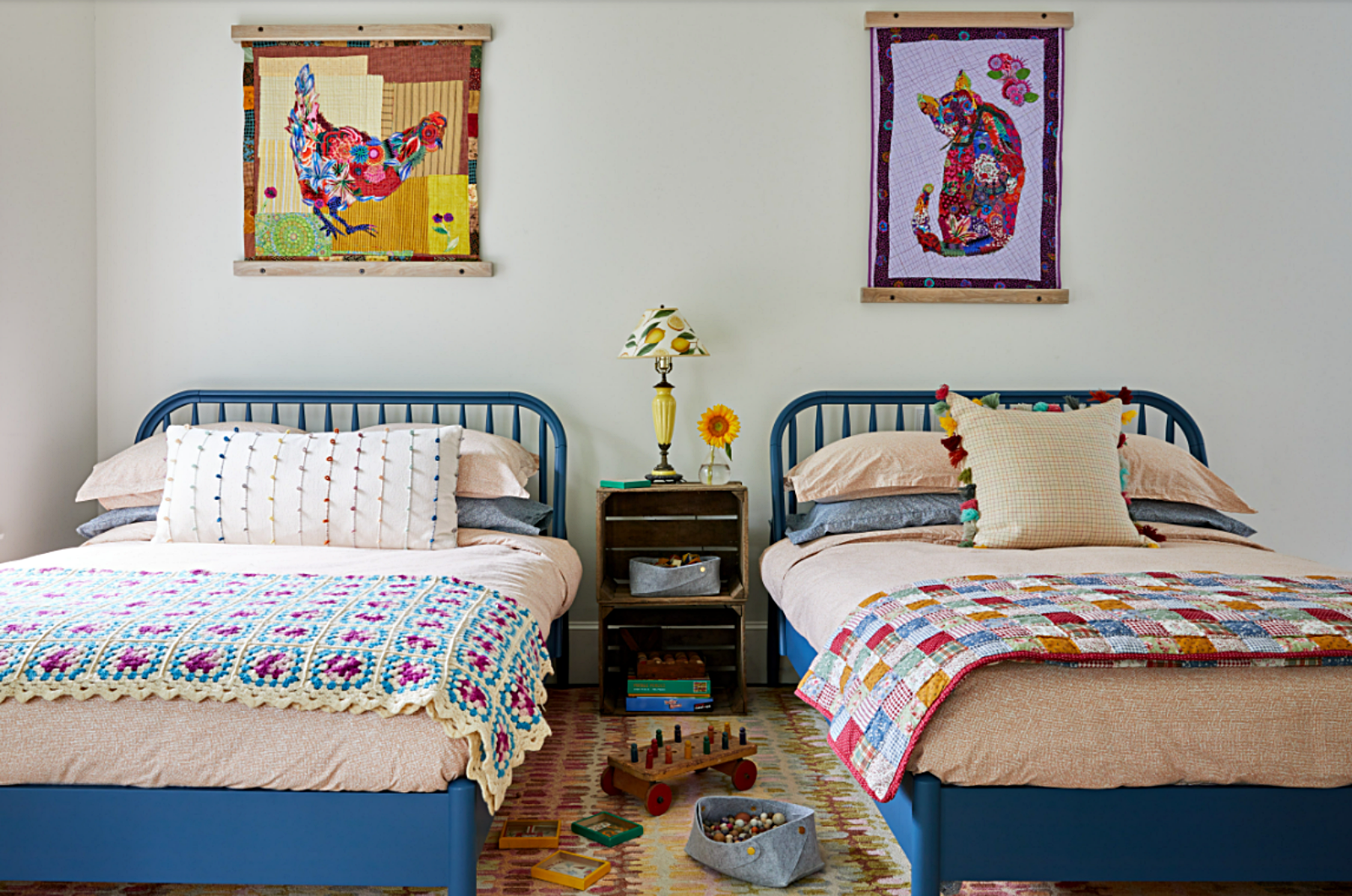 children's bedroom with twin metal beds