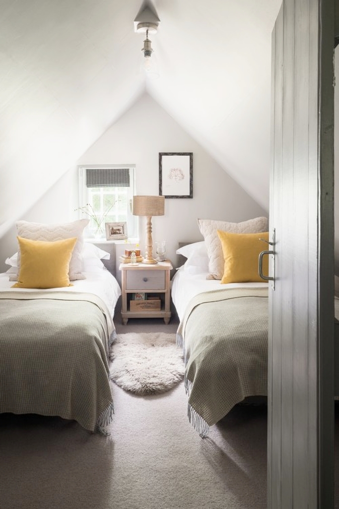 attic bedroom with twin beds