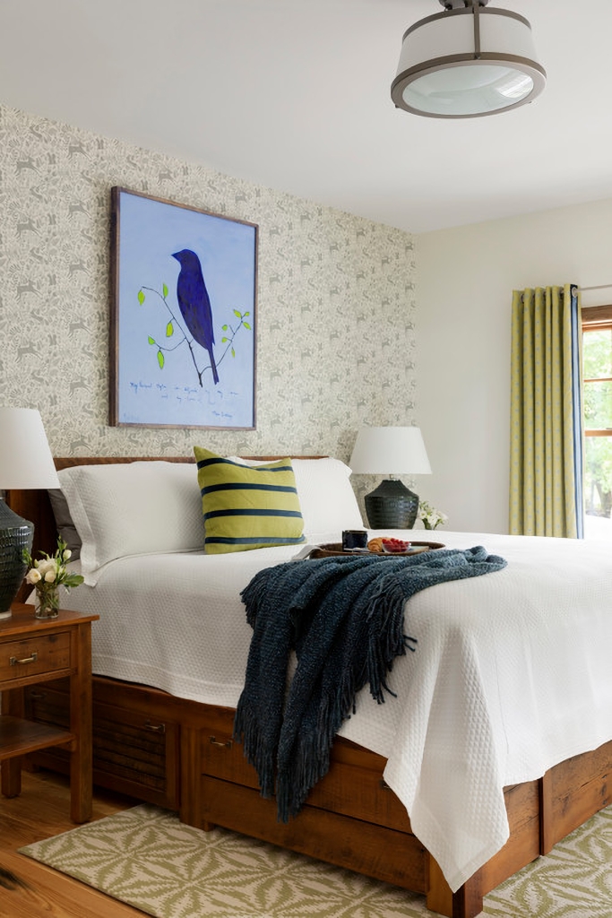 wallpapered accent wall in bedroom