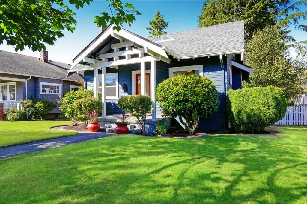 small blue house with white trim