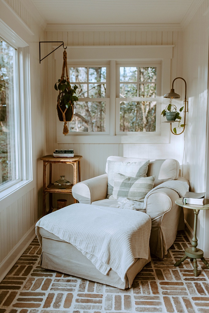 cozy sunroom with brick floor