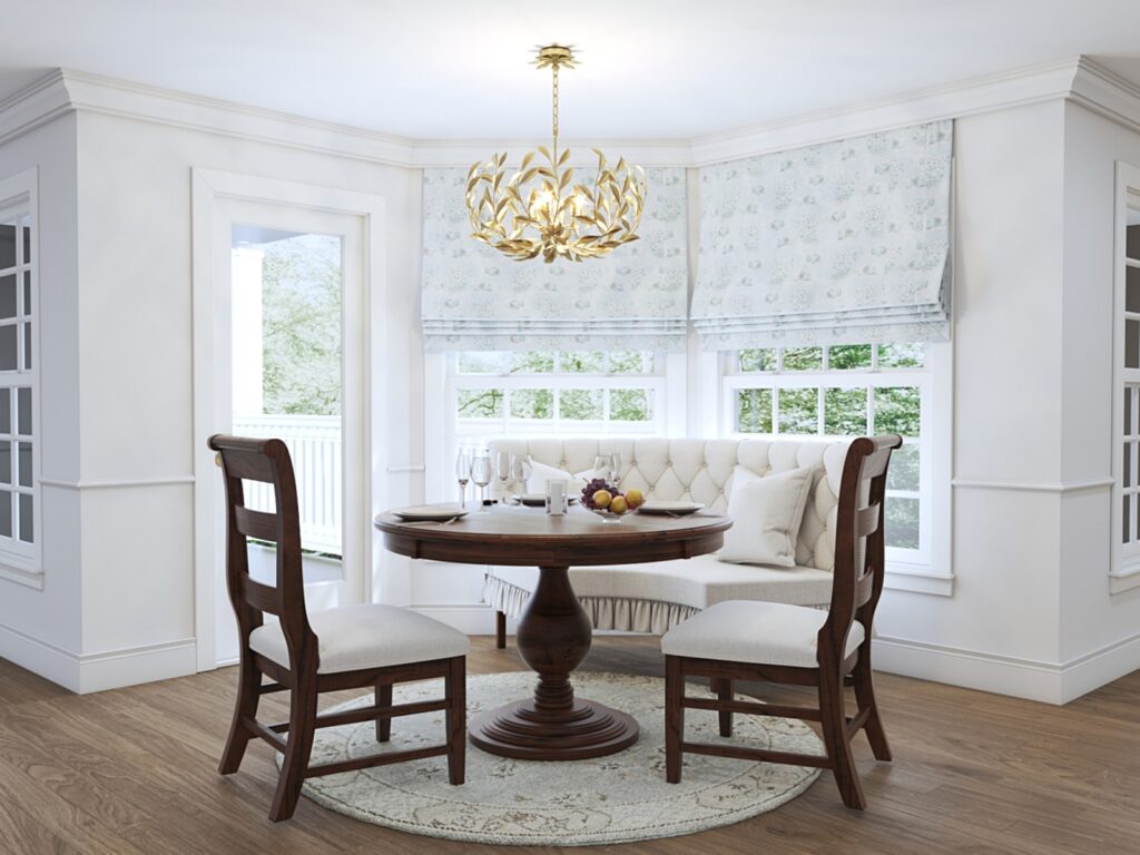 A bright and inviting dining area featuring a round wooden table 
