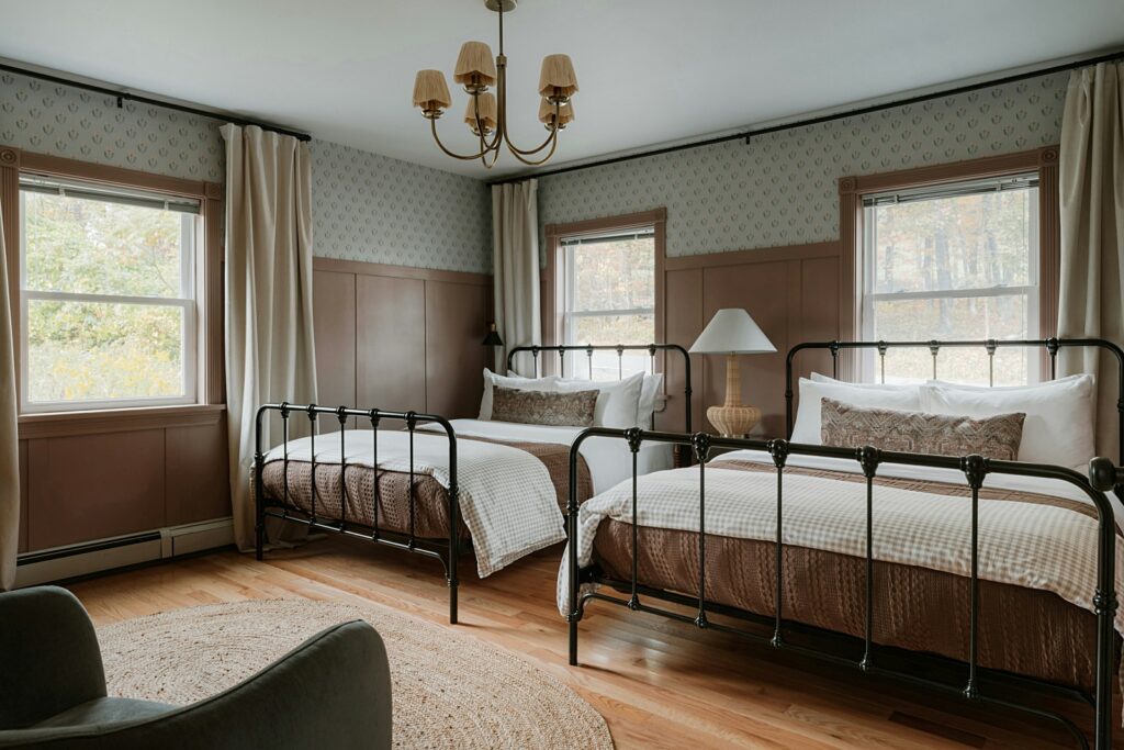 metal double beds in farmhouse bedroom