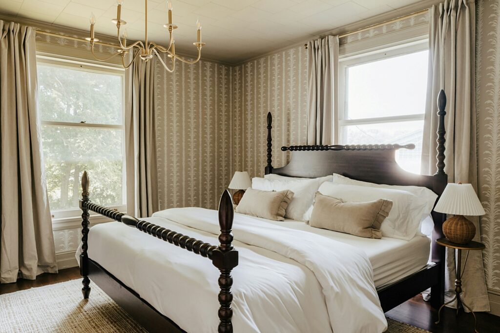 vintage four poster bed in primary bedroom