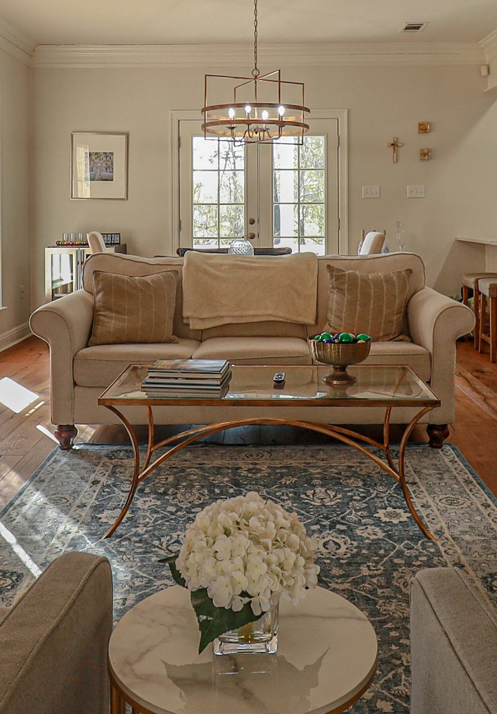 warm and cozy living room with floral rug