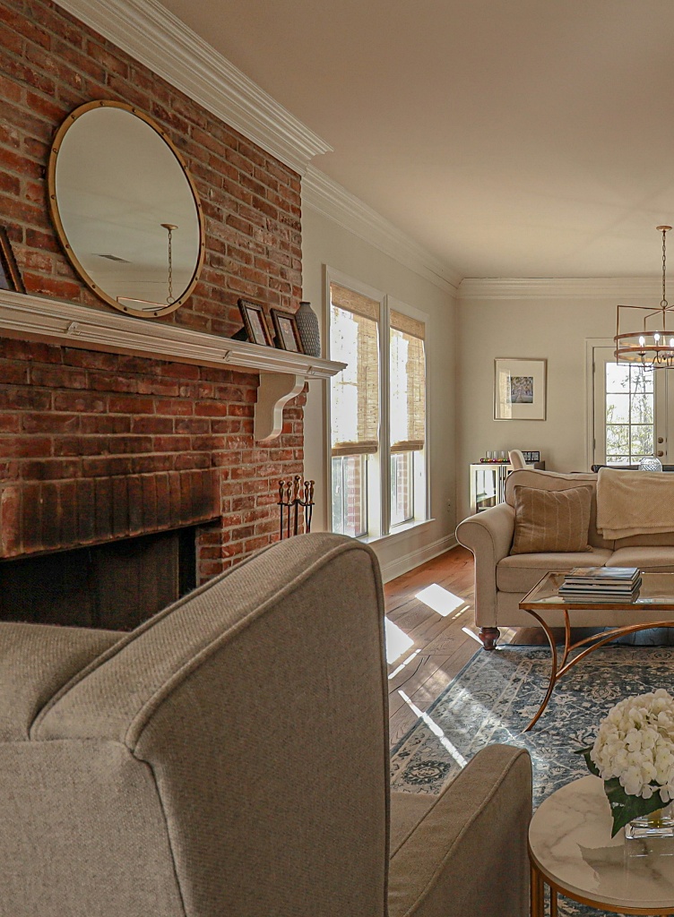 red brick fireplace in family room